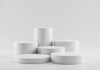 Poster - Minimalistic display featuring five white cylinder podiums arranged in a staggered formation on a white surface