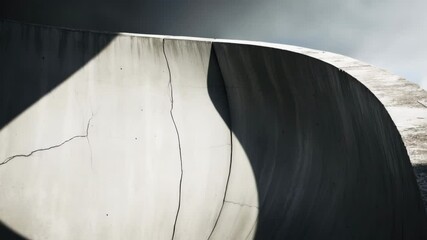 Poster - Architectural details of curved concrete wall against background