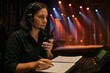 © Rawpixel.com - Stage manager coordinating live performance.