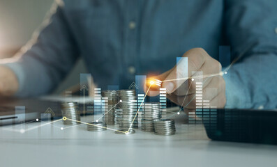 Leinwandbilder - Saving money concept.Stack of coins with trading price graph growth.Money business financial graph diagram of coin. Financial growth data or investment market profit bar and success report.	