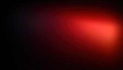 Poster - A glowing red light softly illuminates a dark, abstract background.