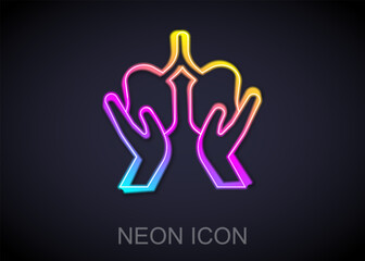 Poster - Glowing neon line Lungs icon isolated on black background. Vector