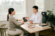 © Daenin - Doctor talking to patient and filling patient history, examination, treatment, medical and health concept.