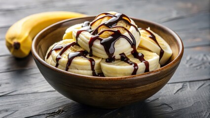 Poster - A bowl of sliced banana topped with rich chocolate syrup, a simple and delicious dessert.