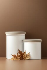 Poster - Elegant product display with autumn leaves on podiums against a brown backdrop a minimalist scene showcasing seasonal charm and a serene neutral aesthetic