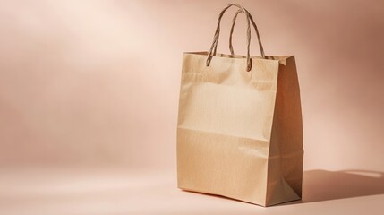 Poster - Simple brown paper bag with twisted handles on a light brown background for shopping or packaging