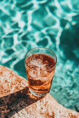 Poster - Refreshing iced drink by the pool on a sunny day perfect for summer relaxation and vacation vibes