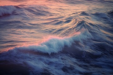 Poster - Waves rolling over the reef at sunset create a beautiful display of colors in the ocean, Reef waves small swell at sunset time, aerial ocean shot