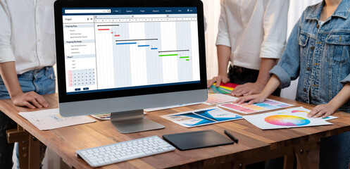 Leinwandbilder - Project planning software for brisk business project management on the computer screen showing timeline chart of the team project
