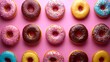 © Julia - A fun and vibrant display of colorful donuts, topped with scattered sprinkles, is captured in an overhead shot against a solid-color background at Donut Delight