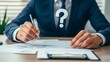 © Mr - Businessman Reviewing Documents with Question Mark Uncertainty Concept