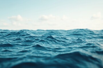 Poster - Tranquil ocean scene with gentle blue waves and soft sunlight