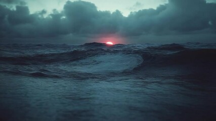 Aufkleber - Dramatic ocean view featuring waves under a dark sky with a setting sun. The image highlights a vast expanse of water and brooding clouds, with the sun near the horizon