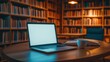 © pornsawan - Laptop with blank screen on table in Modern library or bookstore interior with Learning and coworking space,relax zone,Library with rows of bookshelves,school or university,education concept.