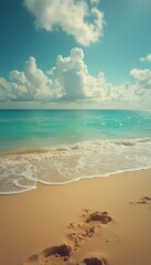 Poster - Tranquil Beach Scene with Turquoise Water, Golden Sand, and Footprints under a Bright Cloudy Sky