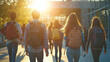 © jainul - group of high school students walks towards the entrance to their building, each carrying backpacks and wearing casual , with sunlight shining on them from behind
