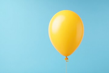 Poster - single yellow balloon with ribbon on smooth pastel blue background emphasizing minimalistic design