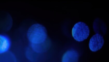 Poster - abstract blue bokeh light circles on dark background for new year design, perfect for web design, digital graphics, posters, and modern branding

