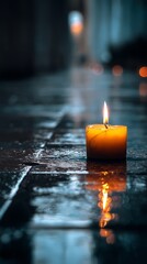 Poster - Lit candle glows on wet tile floor creating a serene atmosphere