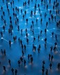 © Pixelcrafts - A large group of people, connected by a network of light trails, creating a sense of interconnectedness.  Many people walking in a city, evening atmosphere