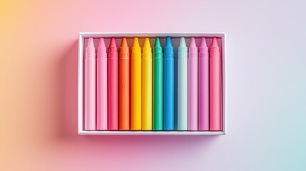 Poster - Vibrant pastel crayons lined up in a gradient inside an open box, with free space ready for creative messages
