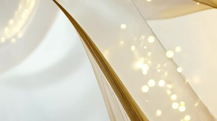 Aufkleber - elegant flowing fabric dances softly, shimmering gold and white hues creating a magical atmosphere g