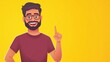 © Johannes - Excited happy positive young indian man student pointing aside with fingers hand gesture at copy space advertising product, presenting sale discount promo offer standing isolated on yellow background