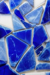 Poster - Captivating Close Up of a Vibrant Blue and White Mosaic Tile Pattern Showcasing Artistic Design and Texture for Creative Projects and Interior Design