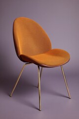 Poster - Elegant orange chair with golden legs on a purple background modern furniture design studio shot minimal style interior decor contemporary seating comfort