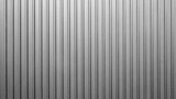 A gray metal background with a pattern of vertical lines. wall is made of metal and has a very clean and modern look for template pages and banners