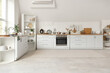 © Pixel-Shot - Interior of kitchen with white counters, shelf units and utensils