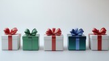 Set of different gift boxes with red, green, and blue ribbons isolated on a white background. New Year or Christmas present concept.  