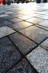 Poster - Gray Paving Stone Texture with Sunlight Reflecting on Surface in Outdoor Urban Area