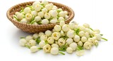 Close-up shot of a woven basket overflowing with fresh jasmine flowers, spilling onto a bright white surface, showcasing natural beauty and fragrance