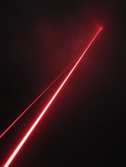 Poster - Red laser beam cutting through the darkness in a straight line for a modern futuristic look