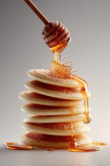 Poster - Golden honey drips onto a stack of fluffy pancakes in a delicious breakfast scene