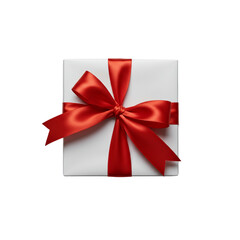 Wall Mural - A white gift box with a red satin ribbon bow on a black background
