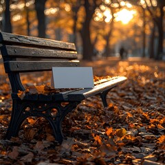 Wall Mural - blank gift card on a wooden bench in an autumn park