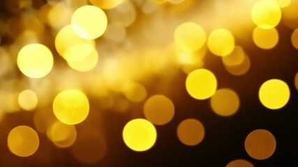 Poster - beautiful golden bokeh lights an abstract background of shimmering warm festive decoration for celeb