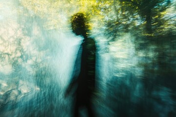 Poster - A blurred figure walks through a sun-dappled forest, creating a dreamlike, ethereal atmosphere.
