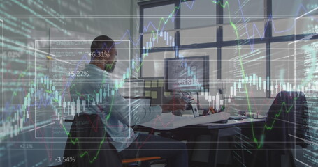 Poster - Image of financial data over african american businessman working on laptop in office