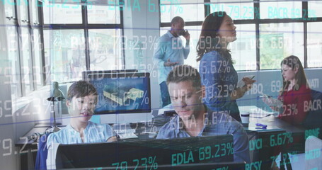 Poster - Image of financial data over diverse businesspeople working on computer in office