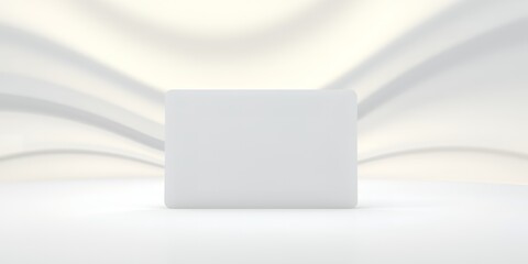 Poster - A white box sitting on a white surface with a white wavy background in a studio setting