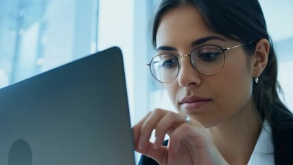 Professional woman working on laptop business corporate portrait modern workplace