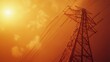 © mandul - High voltage power lines against a fiery orange sky.