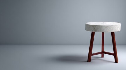 Poster - A polished ebony and walnut stool showcases a glossy finish atop a sleek marble tabletop, set against a neutral backdrop, providing ample copy space on the right