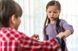 © Art_Photo - Children conflict, emotional struggle and behavior, young girl showing frustration while confronting boy, illustrating childhood disagreement, anger control and early social development
