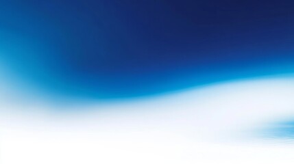 Poster - Soft Blue Waves Blend Together in a Gradient Creating a Serene and Calming Background With Light Illuminating the Top Portion