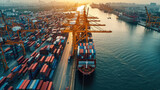 Aerial view seaport shipping container cargo ship industrial sunrise water transportation logistics cityscape. Busy seaport with cargo ships and containers sunrise industrial area waterway
