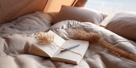 Wall Mural - Cozy tent interior with open journal and pen on soft bedding